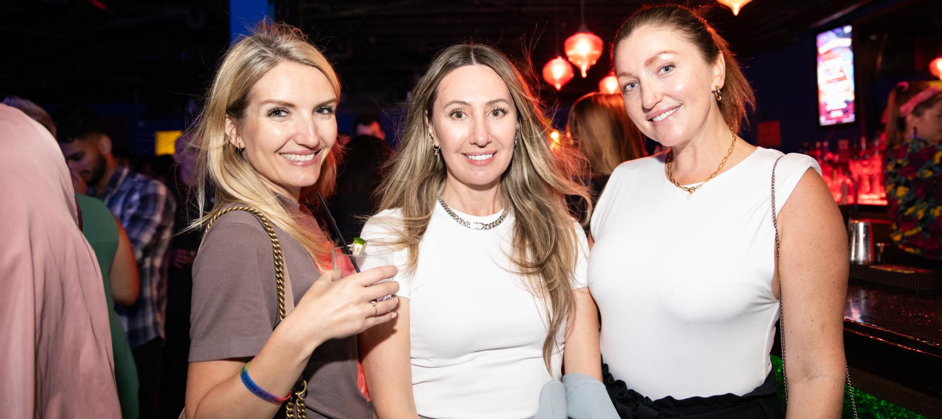 three white women with blonde hair