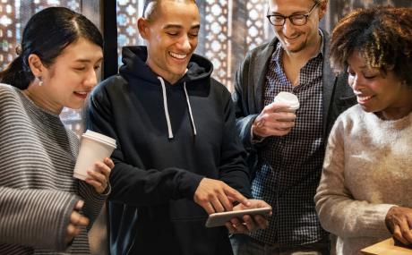 group of young people drinking coffee