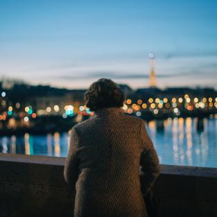 a woman looking at a cityscape