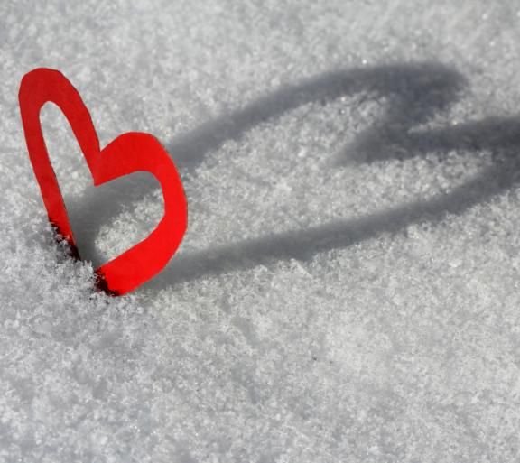 paper heart in snow