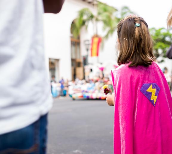 child with cape