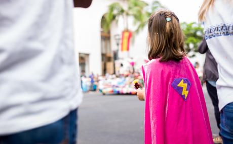 child with cape