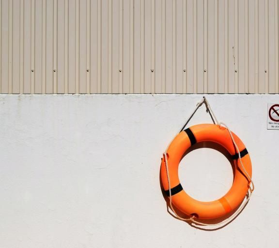 life ring hanging on wall