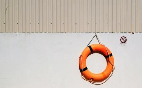 life ring hanging on wall