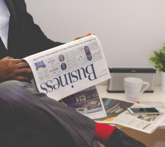 Business man with newspaper